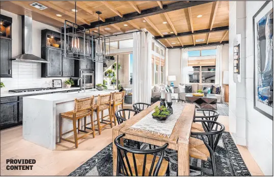  ?? Toll Brothers ?? In Redpoint Square is Cordillera by Toll Brothers, offering three-story townhomes priced from the high $400,000s. PROVIDED CONTENT