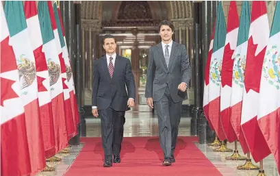  ?? ADRIAN WYLD THE CANADIAN PRESS FILE PHOTO ?? Trudeau with Mexico’s Enrique Pena Nieto during the last Three Amigos summit in 2016. Don’t expect another anytime soon.