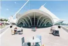  ?? SUBMITTED BY THE MILWAUKEE ART MUSEUM ?? As the Milwaukee Art Museum reopens, is has added socially distant furniture to outdoor spaces so people can safely enjoy to-go food from the cafe.