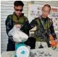  ?? AFP ?? Philippine policemen weigh illegal drugs found during a raid in the house of ex-mayor Fahad Salic, in Marawi on Saturday.—