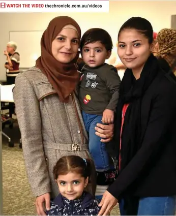  ?? PHOTOS: BEV LACEY ?? LANGUAGE THERAPY: Reham with her son Nabeel and daughter Aseel with Rojin Rash who has volunteere­d as interprete­r.