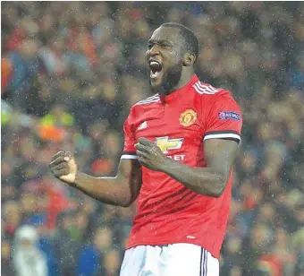 ?? — AFP ?? Manchester United striker Romelu Lukaku celebrates scoring his team’s second goal during the UEFA Champions League Group A match against Basel at Old Trafford in Manchester.