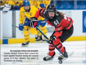  ?? THE CANADIAN PRESS/LIAM RICHARDS ?? Canada forward Victoria Bach moves the puck against Sweden during the second period of a Four Nations Cup game in Saskatoon on Tuesday.