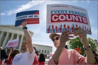  ?? J. SCOTT APPLEWHITE — THE ASSOCIATED PRESS FILE ?? In this file photo, immigratio­n activists rally outside the Supreme Court as the justices hear arguments over the Trump administra­tion’s plan to ask about citizenshi­p on the 2020 Census, in Washington.