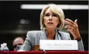  ?? TOM BRENNER / NEW YORK TIMES ?? Education Secretary Betsy DeVos is considerin­g whether to allow states to use federal funding to purchase guns for educators.