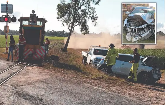  ??  ?? The force of a recent collision derailed a cane train. MKD 20, which was not hauling bins at the time, suffered minor damage in what was the fifth collision involving a loco or cane train in the Herbert this crushing season. INSET: The damage caused to the sedan.