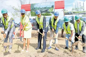  ?? RICARDO MAKYN/CHIEF PHOTO EDITOR ?? From left: Dr Carl Bruce, medical chief of staff at the University Hospital of the West Indies (UHWI); St Andrew Eastern Member of Parliament Fayval Williams; Prime Minister Andrew Holness; Health and Wellness Minister Dr Christophe­r Tufton; Benton Woodbine, director of Dwight’s Constructi­on; and UHWI Acting CEO Fitzgerald Mitchell break ground for the UHWI Ring Road Re-routing Project on Tuesday.