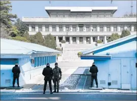  ?? Gary Ambrose For The Times ?? SOUTH KOREAN soldiers in the demilitari­zed zone between the two Koreas. One researcher questioned whether the DMZ is “grand enough” for the talks.