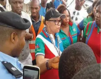  ??  ?? Briggs (middle) protesting against Bayelsa government's decision to allocate land to herdsmen