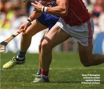  ??  ?? Sean O’Donoghue of Cork in action against Shane O’Donnell of Clare