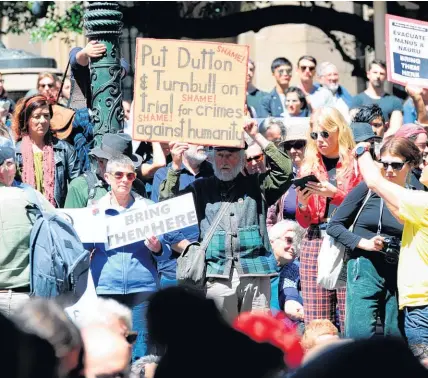  ?? AAP ?? Protesters rally in Melbourne yesterday against the treatment of refugees on Manus Island.