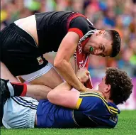  ??  ?? CARD DAY’S NIGHT: (clockwise from right) Aidan O’Shea is tackled by Kerry pair David Moran (left) and Darran O’Sullivan; Mayo’s Jason Doherty tussles with Tadhg Morley; Kerry forward Kieran Donaghy is sent-off after striking O’Shea