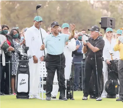  ?? PHOTO ATLANTA JOURNALCON­STITUTION ?? Honorary starter Lee Elder, the first Black golfer to compete at the Masters, waves to the crowd Thursday.