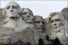  ?? DAVID ZALUBOWSKI — ASSOCIATED PRESS FILE PHOTO ?? The faces of the presidents that make up the Mount Rushmore monument are shown near Keystone, S.D.