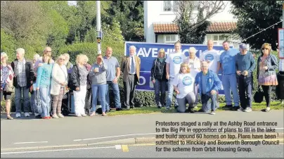  ??  ?? Protestors staged a rally at the Ashby Road entrance to the Big Pit in opposition of plans to fill in the lake and build around 60 homes on top. Plans have been submitted to Hinckley and Bosworth Borough Council for the scheme from Orbit Housing Group.