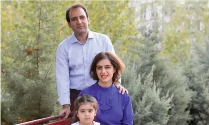  ?? ?? Majid Tavakoli with his wife and daughter. Tavakoli said it will be ‘very distressin­g’ to be away from them during his six-year prison sentence. Photograph: handout