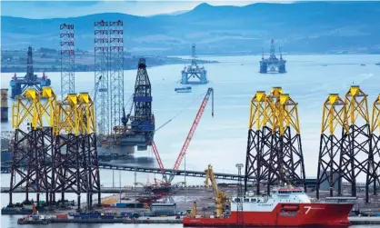  ?? Photograph: Murdo MacLeod/The Guardian ?? Oil platforms and rigs sit in the ‘graveyard’ in Cromarty Firth, Scotland, where many unused rigs have arrived since the outbreak of Covid-19.