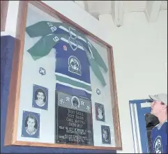  ?? POSTMEDIA NETWORK/FILES ?? A memorial display at the since-renamed Centennial Civic Centre honours the four Swift Current Broncos players killed in a 1986 bus crash. “It’s the kind of tragedy,” writes Postmedia’s Ted Wyman, “that never leaves a community.”