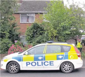  ??  ?? > Police at the scene in Warrington, Cheshire, where a 31-year-old man was arrested yesterday