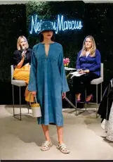  ?? ?? Lisa Aiken and local journalist Carolyne Zinko (background) talk, as models showcase the season's “must-haves” during a luncheon at the
San Francisco flagship.