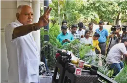  ?? — PTI ?? BJP's chief ministeria­l candidate B. S. Yeddyurapp­a shows victory sign during a press conference, a day after polling for Karnataka Assembly elections, in Bengaluru on Sunday.