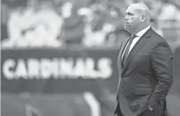  ?? GETTY IMAGES ?? Cardinals general manager Steve Keim looks on prior to the game against the 49ers at State Farm Stadium on Oct. 10 in Glendale.