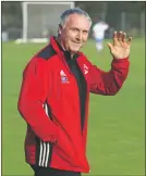  ??  ?? Oban Camanachd manager Ian Hay waves goodbye after taking charge of his last game before handing over the reins to a new boss for next season.