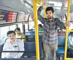  ?? ARIJIT SEN/HT PHOTO ?? Dheeraj Aithal in a BMTC bus on his way to office in Marathahal­li, Bengaluru.