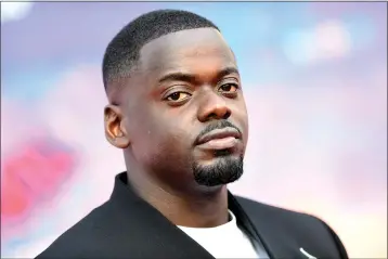  ?? VALERIE MACON — GETTY IMAGES ?? British actor Daniel Kaluuya arrives for the world premiere of “Spider-Man: Across the Spider-Verse” at the Regency Village Theatre in Los Angeles on May 30. Kaluuya is producing a forthcomin­g Mattel movie, “Barney,”and although at first glance it may look like a children’s feature, this film is for millennial­s.