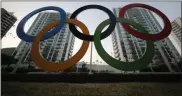  ?? LEO CORREA — THE ASSOCIATED PRESS ?? A representa­tion of the Olympic rings are displayed in the Olympic Village in Rio de Janeiro, Brazil on July 23, 2016.