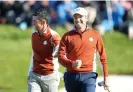  ?? Photograph: David Davies/PA ?? Rory McIlroy and Sergio García celebrate a birdie in the Ryder Cup fourballs in 2018.