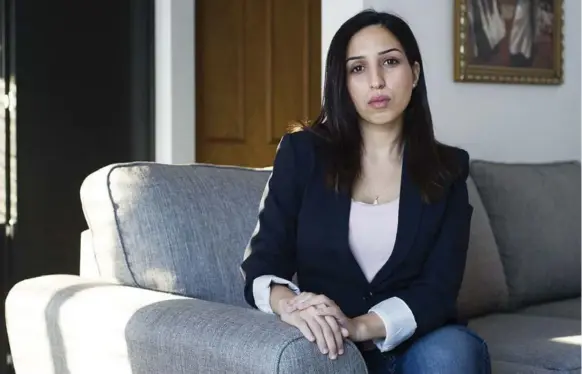  ?? GRAHAM HUGHES FOR THE TORONTO STAR ?? Kaoutar Belaaziz, who has worked at a Montreal call centre for seven years, says the abuse by customers has gotten worse. “They are not bound by social norms over the phone.”