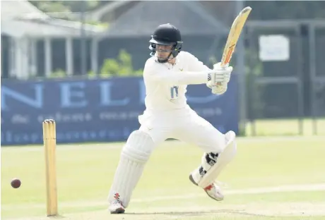  ?? Peter Rogan ?? Teenager George Lavelle on his way to a fine half century