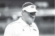  ?? MICHAEL REAVES Getty Images/TNS ?? UF says 21 players and two coaches have tested positive for COVID-19; head coach Dan Mullen has not tested positive.