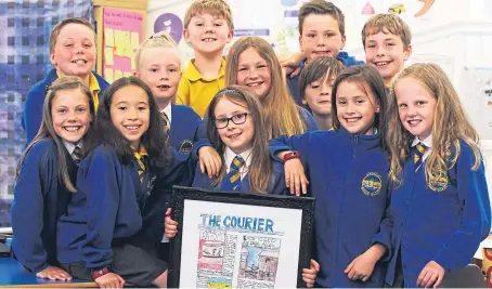  ?? Pictures: Mhairi Edwards. ?? Top: The Courier’s Junior Journalist winner Rosie Donnelly with her framed front page. Above: Rosie pictured with classmates at Limekilns Primary.