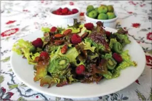  ?? PHOTO COURTESY OF RACHEL VANDUZER, WEAVER’S ORCHARD ?? Kiwi berries star in this simple, delicious salad.