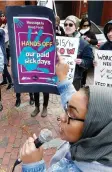  ?? TONY CALDWELL ?? Workers, most of them unionized, protest on Somerset Street on Wednesday.