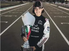  ??  ?? Amna Al Qubaisi after winning the Rotax Max Challenge series