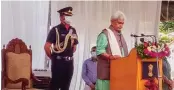  ?? — PTI ?? Former Union minister Manoj Sinha takes oath as the new lieutenant-governor of Jammu and Kashmir in Srinagar on Friday.