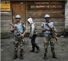  ?? Jerome Delay/Associated Press ?? Soldados da ONU patrulham cidade de Goma (R.D.Congo)