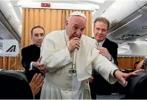  ?? PHOTO: REUTERS ?? Pope Francis talks to journalist­s during a press conference on his return flight from Cairo to Rome yesterday.