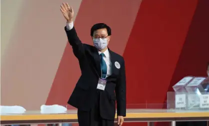  ?? Jérôme Favre/EPA ?? John Lee, Hong Kong’s former No. 2 official, declares victory in the secret ballot to become the city’s next chief executive. Photograph: