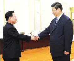  ??  ?? BEIJING: Chinese President Xi Jinping (right) greets North Korean Vice Marshal Choe Ryong Hae in Beijing yesterday.