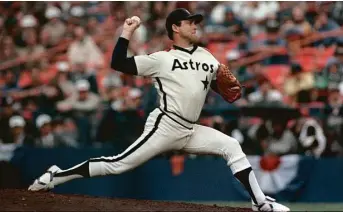  ?? Houston Chronicle file ?? Nolan Ryan was 39 when he pitched against the New York Mets in Game 5 of the 1986 National League Championsh­ip Series in what would be his final postseason appearance.