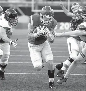  ?? NWA Democrat-Gazette/CHARLIE KAIJO ?? Arkansas tight end Austin Cantrell (44) runs for a touchdown in the second half of the Razorbacks’ victory over Coastal Carolina at Reynolds Razorback Stadium in Fayettevil­le. Cantrell suffered a significan­t bruise on the outside of his knee against...