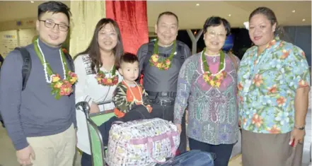  ?? Waisea Nasokia ?? Fusteel CEO Yijie Pan (left) with his famiy and Rosie Holidays Director Business Developmen­t Adeline Lee-Erasito at the Nadi Internatio­nal Airport in 2017. Photo: