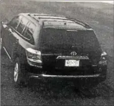  ?? SUBMITTED IMAGE ?? Hamilton resident Dina Ghanem’s black Toyota Highlander (NJ license plate number NUZ-15U) was cited for an E-Z Pass violation on the day it was stolen crossing the Trenton-Morrisvill­e Bridge. This is a picture of the vehicle committing the violation.