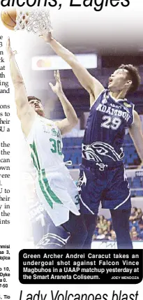  ?? JOEY MENDOZA ?? Green Archer Andrei Caracut takes an undergoal shot against Falcon Vince Magbuhos in a UAAP matchup yesterday at the Smart Araneta Coliseum.