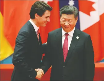  ?? DAMIR SAGOLJ/ REUTERS ?? Canada's new framework for China is overdue, says Kevin Carmichael. He says failing to constructi­vely engage now will be harmful. Above, PM Justin Trudeau meets Chinese President Xi Jinping.