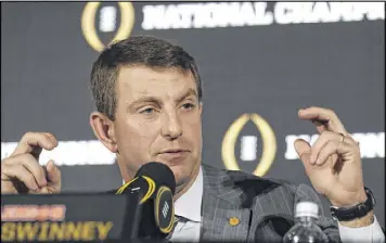  ?? CHRIS O’MEARA / AP ?? “Eight years ago, I don’t think anybody saw us as a national championsh­ip contender,” says Clemson coach Dabo Swinney after winning the Tigers’ first title since 1981.